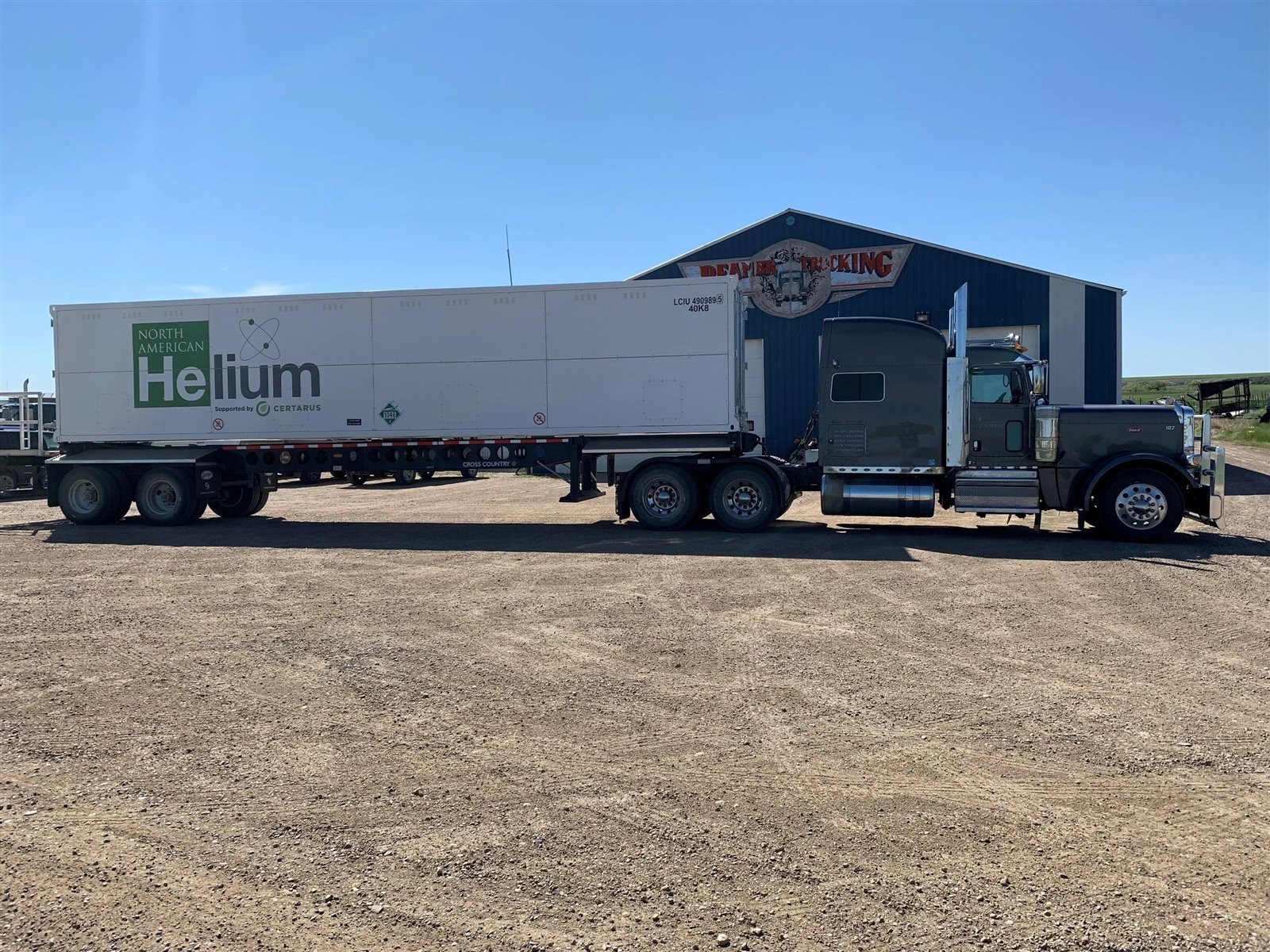 Reamer Trucking helium container trailer in front of the shop in Consul, Saskatchewan