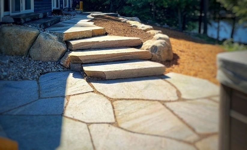Mossy Rock Property Services granite hardscape project in Muskoka