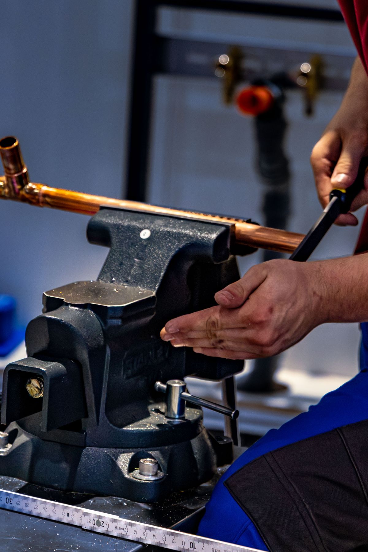 Plumber working on copper pipe