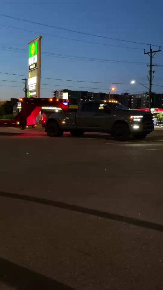 TL Hauling truck and trailer at night in the city
