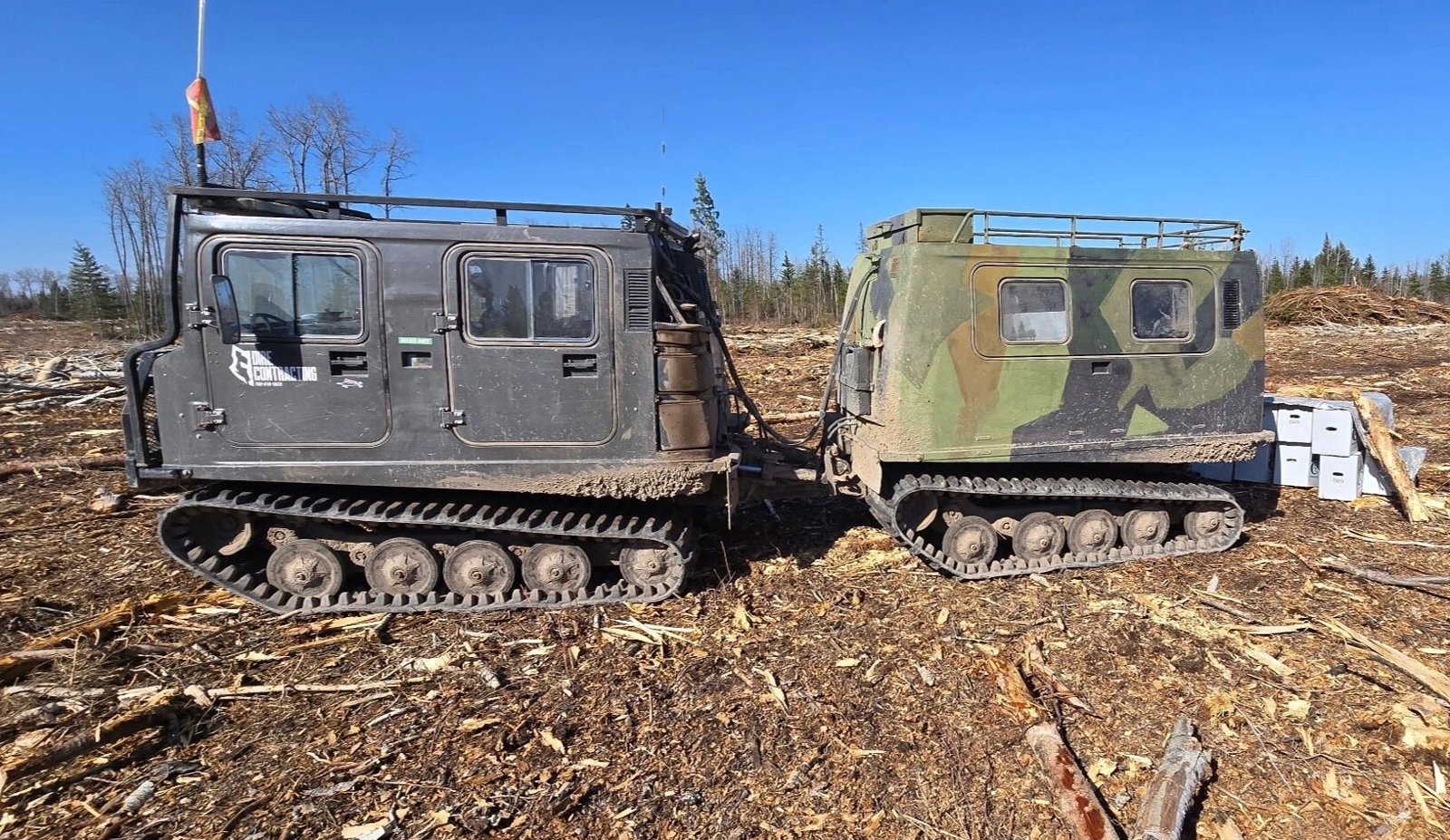 Two Hagglunds BV206 tracked carriers