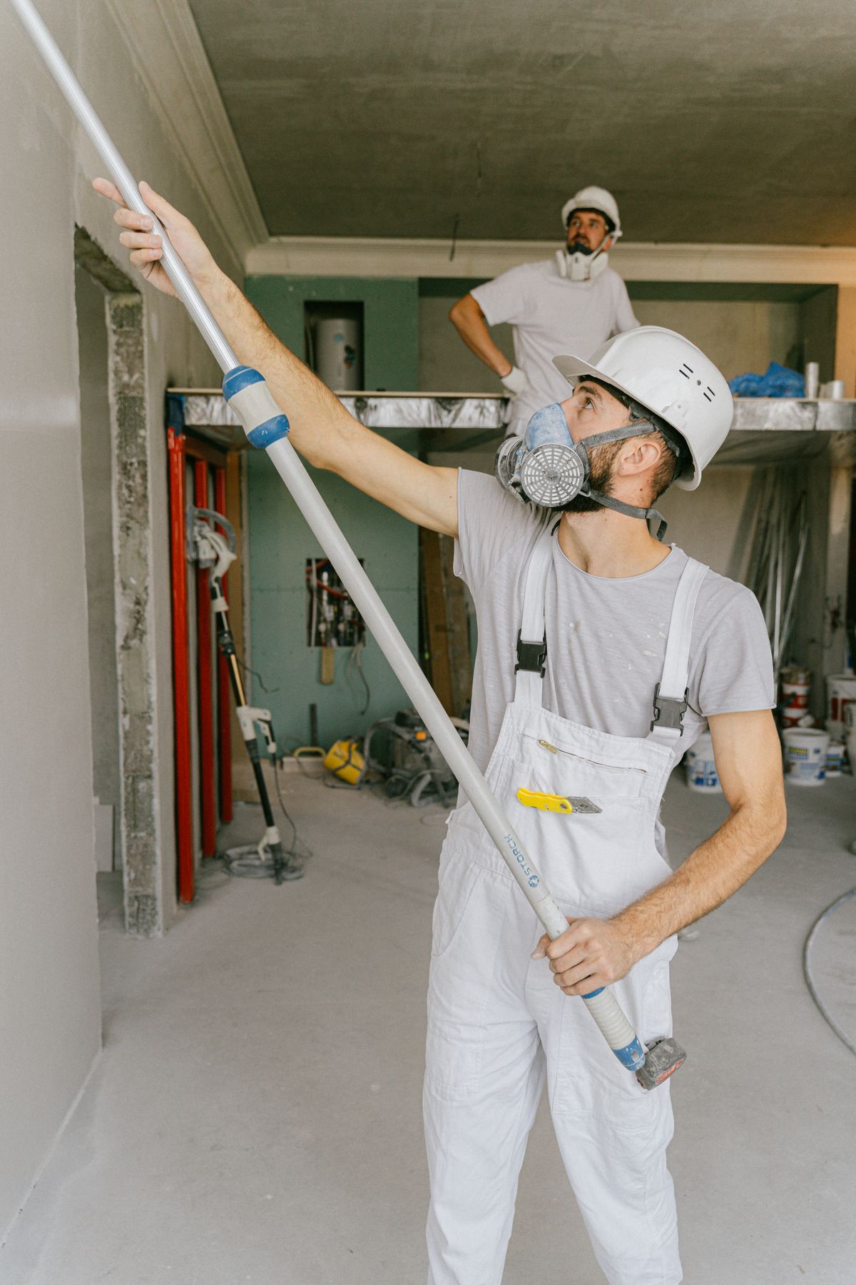 Workers renovating a house