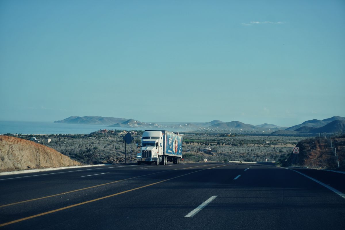 Truck and trailer on the road, hotshot transport from Peterborough Ontario